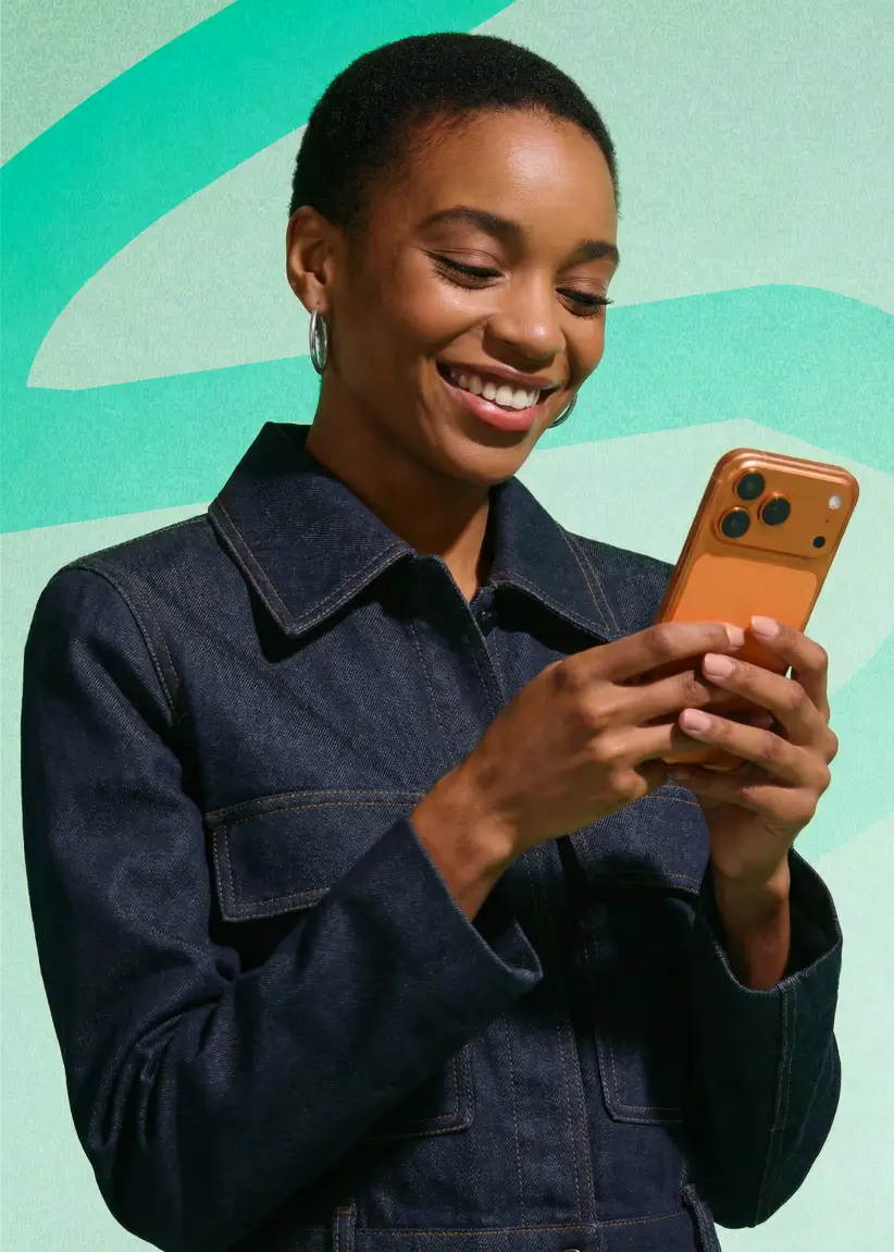 Smiling Fexiva customer using the mobile app