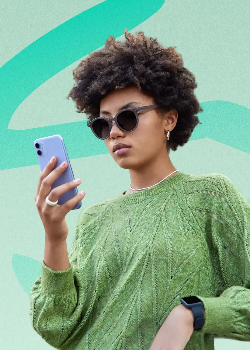 Smiling Fexiva customer using the mobile app